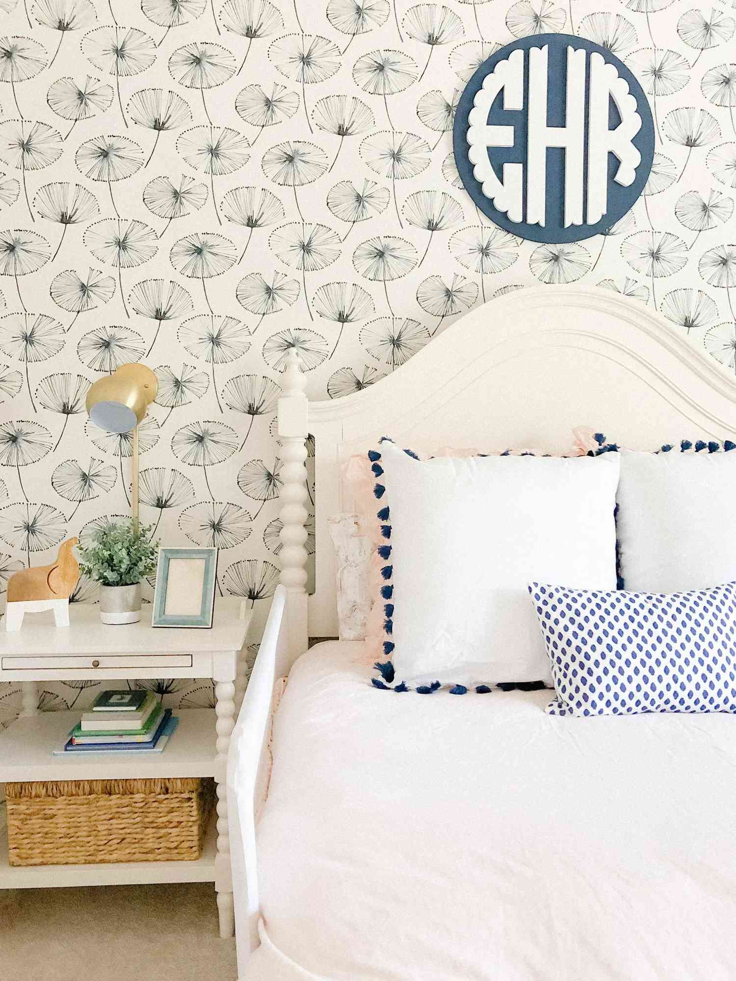 monogram decal above bed